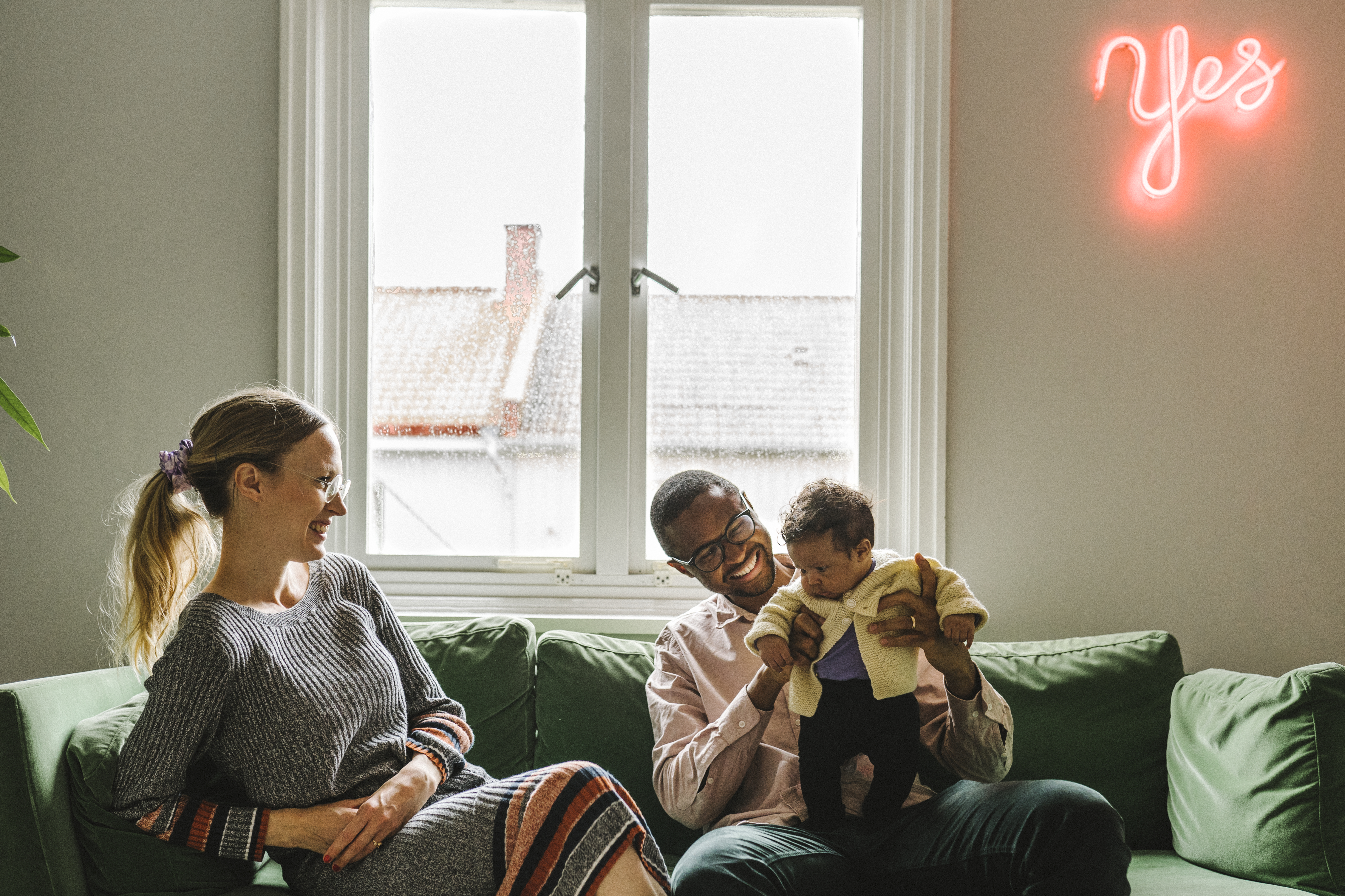 Family Sitting On A Couch