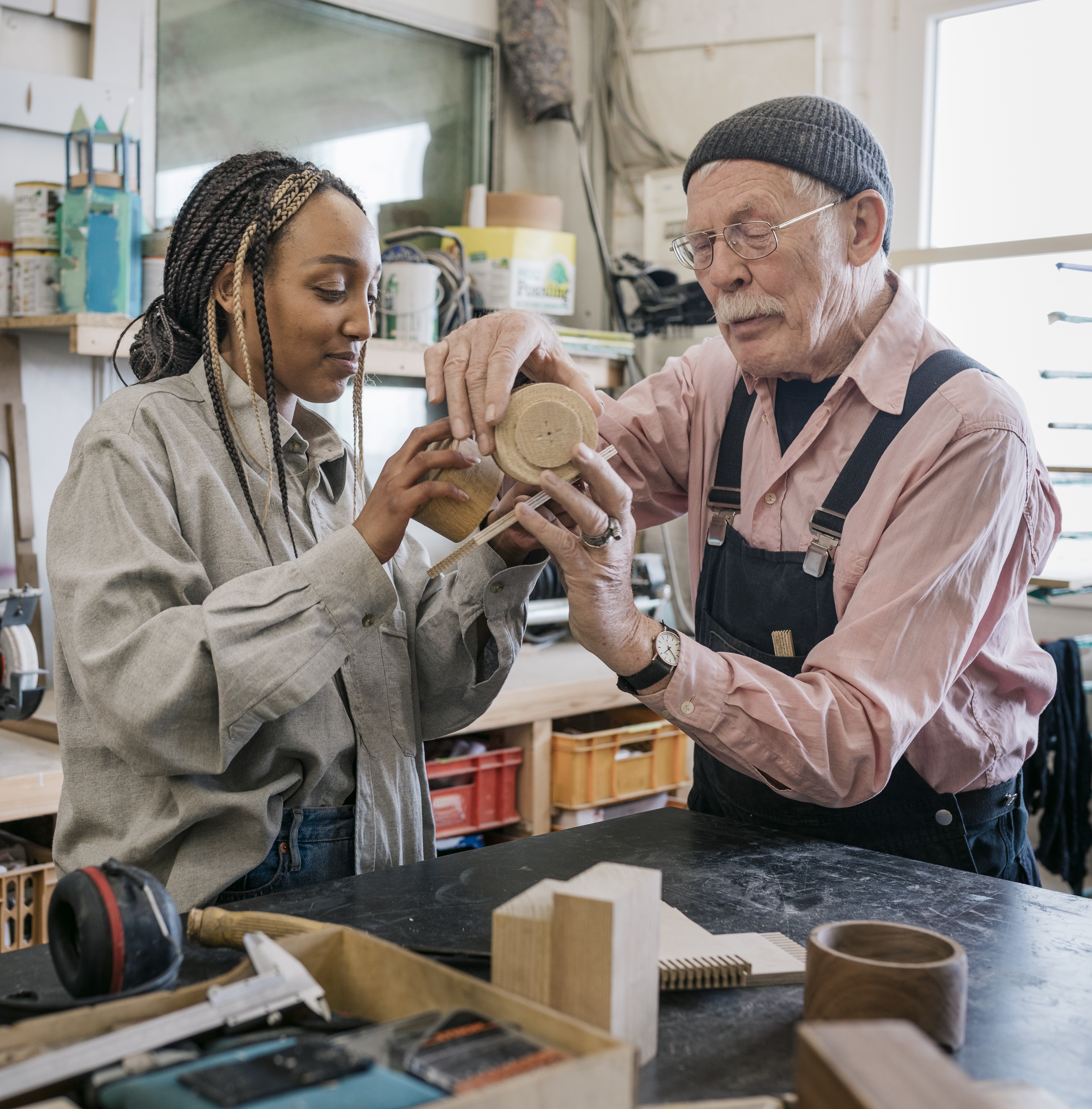 Two People In A Workshop Portrait